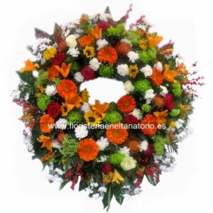Corona floral con Lilium, Girasoles, Gerberas, Anastasias, Rosas y Margaritas.