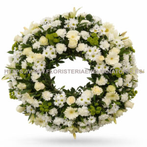 Corona floral con Gerberas, Anastasias, Rosas, Brassicas y Margaritas.